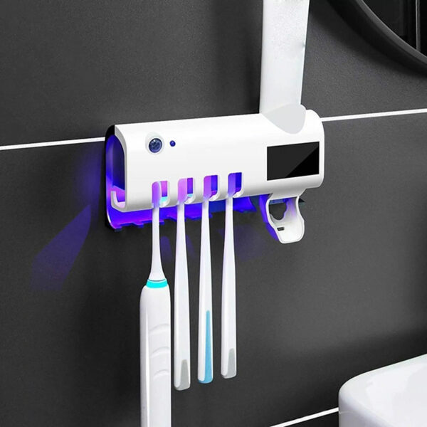 Dispensador dental con esterilizador para cepillos de baño Fainsa